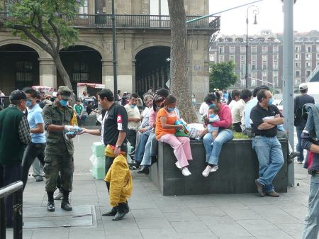 Mexican soldiers issuing the public face masks